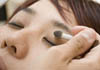 Woman having make over