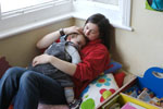 mum with toddler on chest