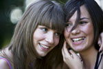 two girls laughing