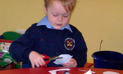 Child doing a craft activity at the museum