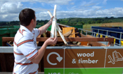 Man at a waste recycling centre