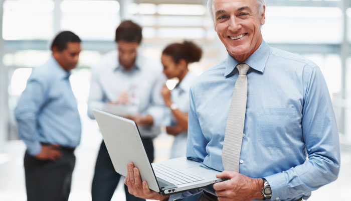 Man in office with laptop