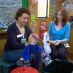 Staff using puppets and toys