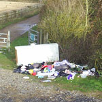Rubbish dumped by gates