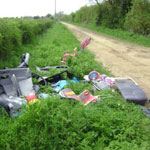 Rubbish dumped by country lane