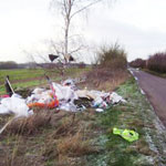 Rubbish dumped beside a road