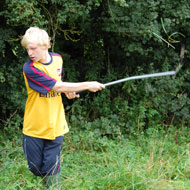 Anthony cutting back undergrowth